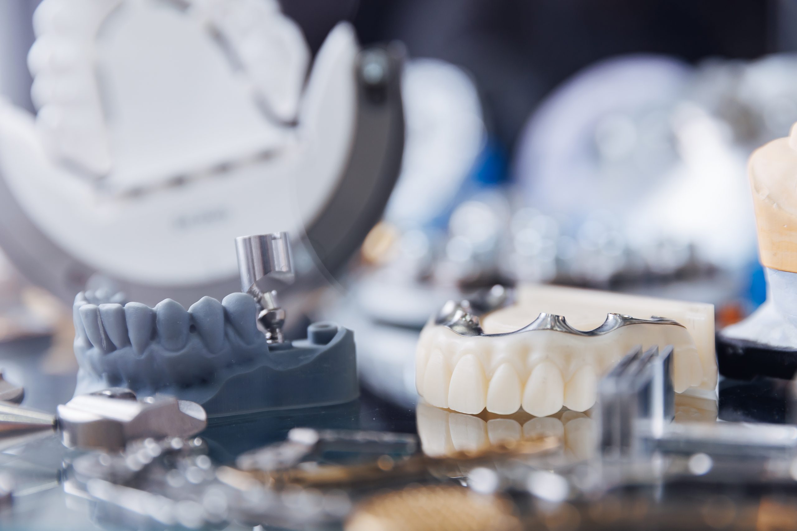 Advanced cnc machine crafting precise dental prostheses in modern laboratory.